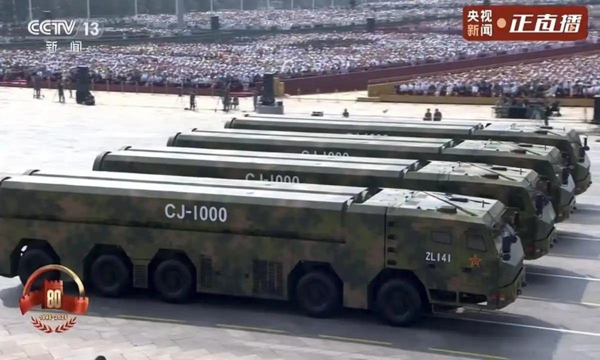 CJ-1000 missiles on their transporter erector launchers during a military parade.